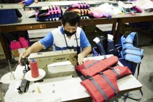 Sewing life jackets | Fly n Float Thailand