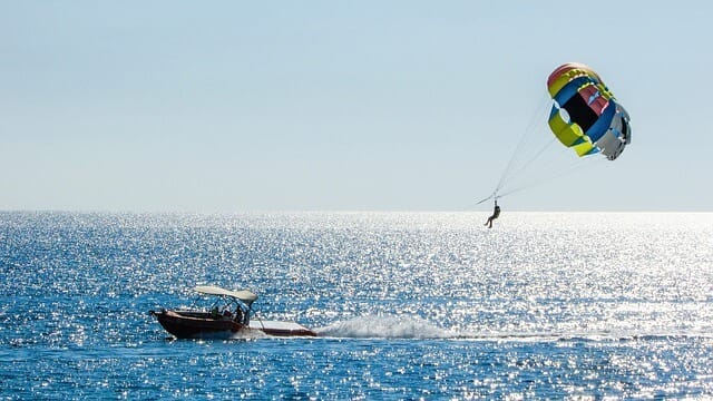 parasailing above the water